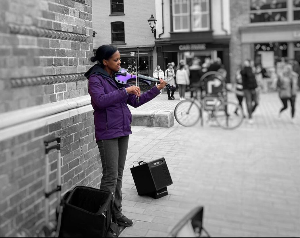 Purple fiddle black and white photo busking in Linoln, Lincolnshire
